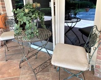 Small patio table and chairs; cushions sold separately