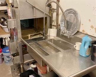 Knight dishwasher and stainless tables