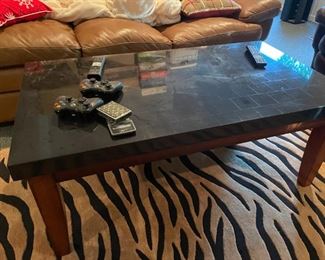 . . . . a black tile coffee table
