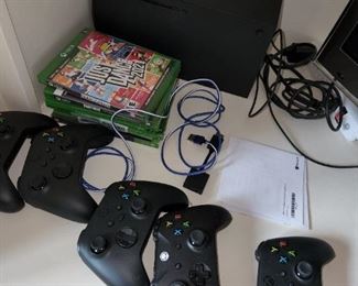 xbox gaming unit, games and controllers, recently purchased