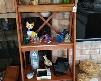 Goebel signed cat, Porcupine sewing basket (top middle), polaroid camera  
