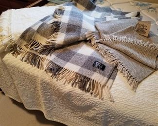 Rare find in pristine condition.  Jacob's Wool, U.K. and Traditional Textiles throw hand woven on 18c bain frame loom among other lovely bedspreads