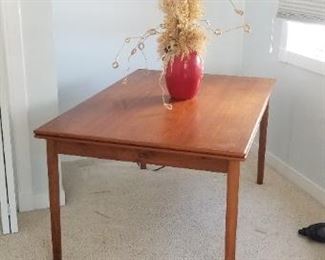 Mid-century modern teak table with two leaves