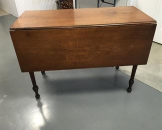 Antique walnut drop leaf table.  Excellent shape. 41"wide, 28" tall, 41"x44" with leaves extended.