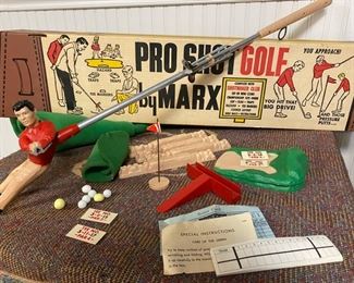 MidCentury.  This was designed by Arnold Palmer to improve their golf game but also just fun to play.  Complete set of clubs and other pieces included.