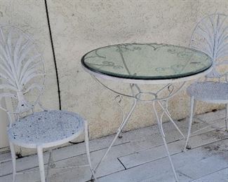 2 Patio set 3 pieces 

Table 29” X 29.5” diameter , chairs 37” X 16” 