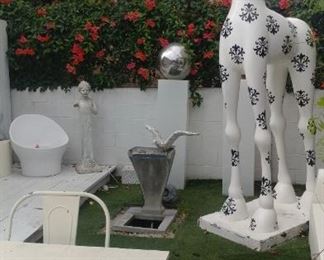 1.  $3,000.00 Giraffe.  128”H X 54” X 31” 
