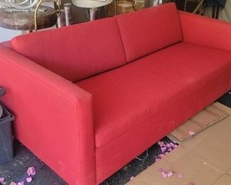 23.  $150.00  Red sleeper sofa no stains some fraying to fabric 
25” X 67” X 34” 
