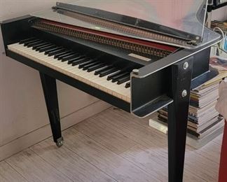 37.  $250.00  Baldwin Harpsicord.  Needs work.
41” X 36” X 54” 
