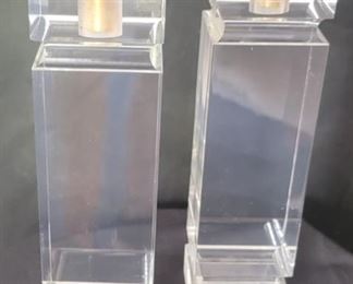 32.   $500.00.  Charles Hollis Jones, signed,  pair Lucite candle holders 
9.5” X 3” X 3” 
