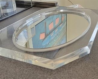 69.   $50.00.   Lucite vanity tray.  17.5” X 11” 
