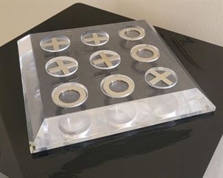 68.  $750.00.  Charles Hollis Jones  Lucite Tic Tac Toe game.Chrome pieces w/ clear Lucite board.  7.5” X 7.5.” 

