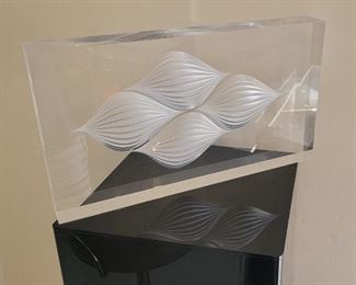 66.  $800.00  Charles Hollis Jones signed sculpture.  
9” X 16” X 2” 
