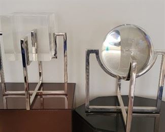 74.  $6,000.00.  Charles Hollis Jones signed pair sculptures                                                                                                1 / chrome with Lucite crystal ball                                                         1/ chrome with Lucite square 
1/ 14” X 12.5” X 12.5”   2/ ? need to measure 
