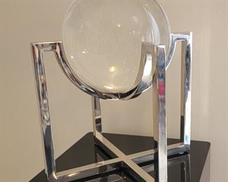 72.   $3,000.00.  Charles Hollis Jones signed chrome base with crystal ball sculpture.  14” X 12.5” X 12.5” 
