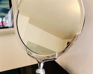 79.  $300.00  Charles Hollis Jones signed cheval style table mirror.    15” X 10.5”d 

