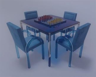 87.  $3,000.00.   Charles Hollis Jones  game table blue / clear lucite with chome base table ONLY.                                                                                      Note:  Chairs are another lot and are sold.  Chess set not included in this grouping. 
29.5” X 42” X 42” 
