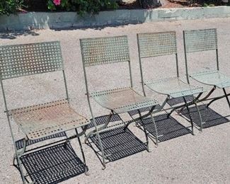 89.  $600.00.   Set 4 metal folding chairs.  33” X 14” X 21” 
