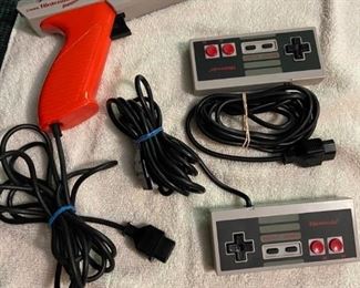 controllers and gun for the Nintendo system