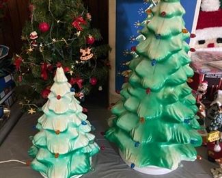 2 hard plastic Christmas trees-  12" and 21"