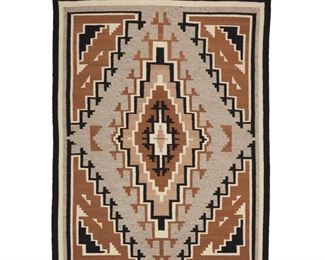 2016
A Navajo Two Grey Hills Rug
Mid-20th Century; Diné
Woven in natural grey, black, cream, brown and light brown wool with central concentric stepped diamonds and stepped motifs to corners
56.75" H x 42" W
Estimate: $400 - $600