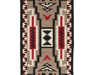 2018
A Navajo Regional Rug
First Half 20th Century; Diné
Woven in red, cream, black and grey wool with an elaborate x-motif flanked with serrated columns
83.5" H x 54" W
Estimate: $700 - $900