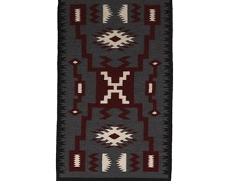 2021
Anna Yellowhair (20th Century, Diné)
A Navajo storm pattern rug
Woven with red, grey, cream and black wool in a storm motif with black stepped sawtooth side edges
43.25" H x 25.5" W
Estimate: $400 - $600