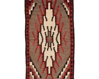 2019
A Navajo Klagetoh Rug
First Half 20th Century; Diné
Woven in grey, cream, black, and red wool with large center stepped diamond, stepped corners and a diamond border
79" L x 39" W
Estimate: $200 - $400