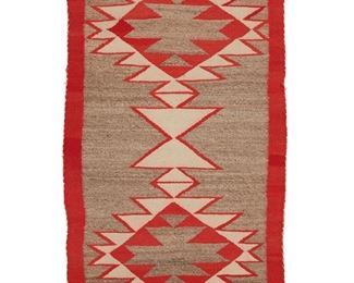 2023
A Navajo Regional Rug
First-Quarter 20th Century
Woven in grey, cream and red wool, with conjoined serrated diamond motif
42.5" H x 27" W
Estimate: $200 - $300