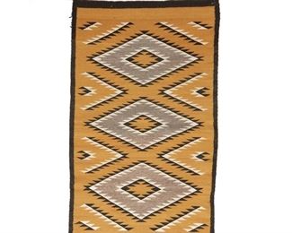 2032
Lucy Roanhorse (20th Century, Diné)
A Navajo Chinle style rug
Woven in ochre yellow, light grey and black wool with three serrated diamonds and floating side elements, with a black border
47.5" L x 29" W
Estimate: $200 - $400