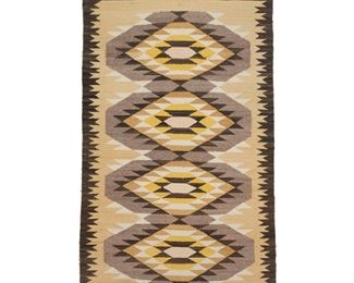 2033
A Navajo Regional Rug
Mid-20th Century or Later; Diné
Woven in yellow, cream, mustard, grey, and black with four stacked serrated diamonds and elaborate border
57.25" H x 34" W
Estimate: $400 - $600