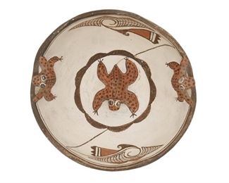 2092
A Zuni Three Frog Pottery Bowl
First Half 20th Century
Unsigned
A polychrome pottery bowl with sculptural frogs, two at rim and one in the interior center, with geometric motifs to interior and exterior
4" H x 8.125" Dia.
Estimate: $300 - $500