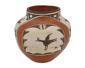2094
Victoria Herrera (B. 20th Century, Zia Pueblo)
A Zia pottery vessel
Signed to underside: Victoria Herrera
A small polychrome jar with birds and geometric motifs
5" H x 5" Dia.
Estimate: $200 - $300