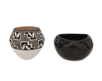 2095
Two Southwest Pueblo Pottery Vessels
Two works:

A Barbara Martinez blackware bowl
(b. 1947, Santa Clara Pueblo)
A small bowl with carved motifs to three shoulders
Signed to underside: Barbara Martinez / Santa Clara Pueblo
3" H x 5" Dia.

A Lucy M. Lewis pottery jar
(1898-19912, Acoma Pueblo)
A small pottery jar with two rows of black geometric banding on white slip
Signed to underside: Lucy M. Lewis / Acoma
4" H x 4.25" Dia.

2 pieces
Estimate: $200 - $300