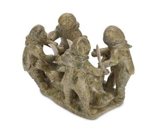 2098
Elijah Michael (1929 - 2008, Inuit)
An Inuit carved stone sculpture
Signed to front base in syllabics
A large carving in green stone of four figures, each with carved bone knife, standing over a supine polar bear, 5 pieces
12" H x 17" W x 11.75" D
Estimate: $1,000 - $1,500