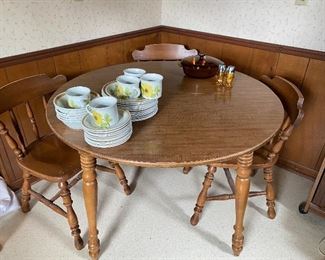Laminate top kitchen table with 2 leaves and 6 chairs