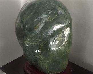 Huge piece of jade, measures 10" in diameter and over 14" tall. Weight is approximately 70 lbs.