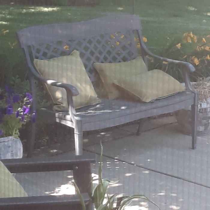 Cast aluminum  bench,  basket weave  pattern 