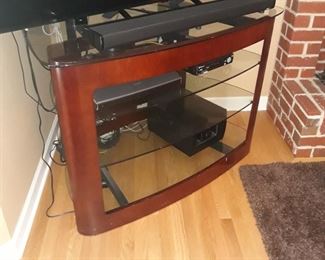 Glass and wood. corner TV stand