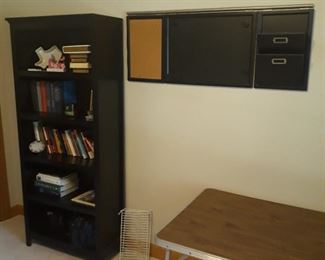 Black office type shelf with matching posting board