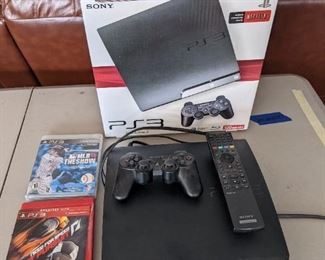 PS3 with games and remote