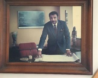 MR WILLIAM E BRAZLEY IN PENTHOUSE HOME OFFICE. 