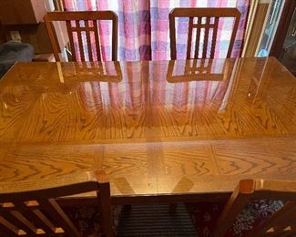 Kitchen table has glass top included
