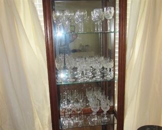 Lighted, mirrored curio cabinet with Gorham crystal stems