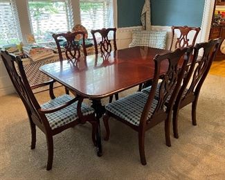 Antique dining room table and (8) chairs (fabric matches the armchair!!).....