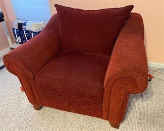 Red upholstered armchair