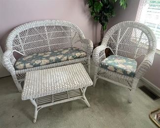 Wicker loveseat, (2) chairs and coffee table