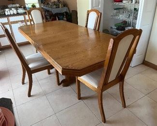 Dining/kitchen table (shown with leaf) and 4 chairs