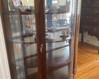 Curved glass china cabinet