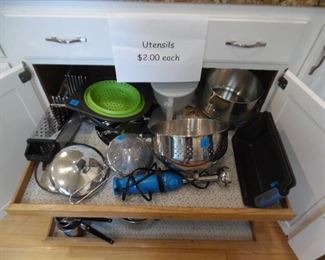 Open the drawers and look around, because all the kitchen stuff is for sale.  It's ok to be nosey at this sale!!